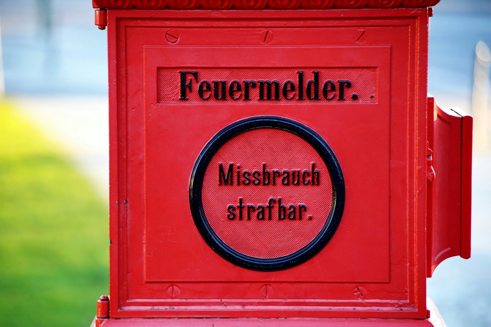 a red mailbox with a message written on it